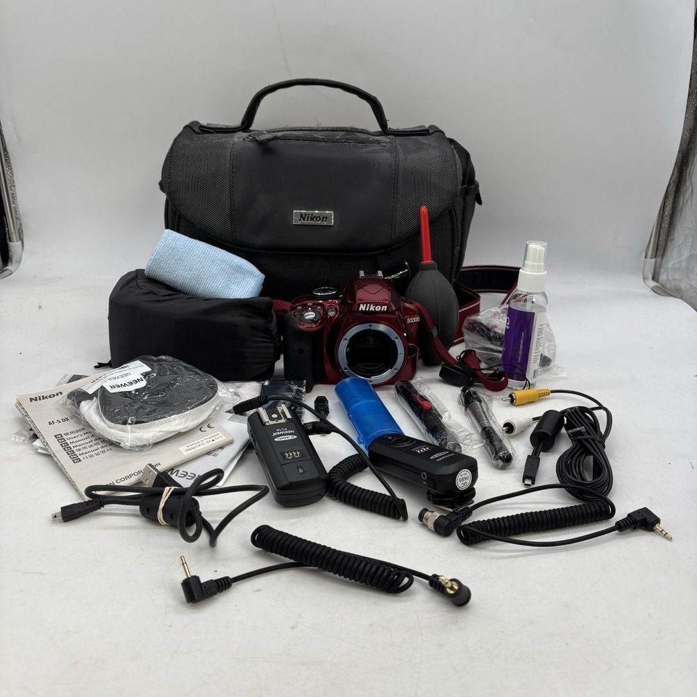 Nikon D3300 24.2MP Digital SLR (DSLR) Camera Red Bundle Cleaning Supplies Flash